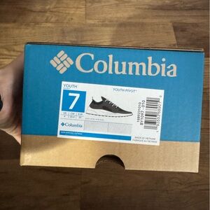 New Columbia youth pivot hiking shoes in black and white